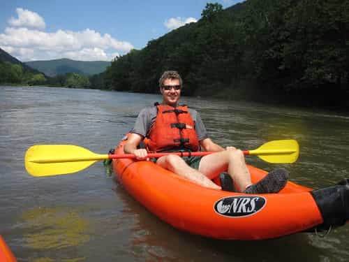 guy in an inflatable kayak