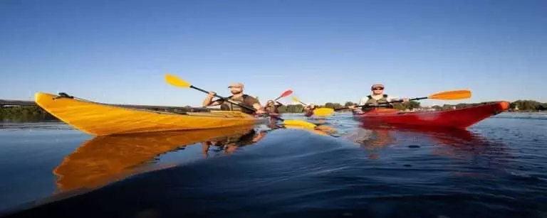 People paddling a kayak